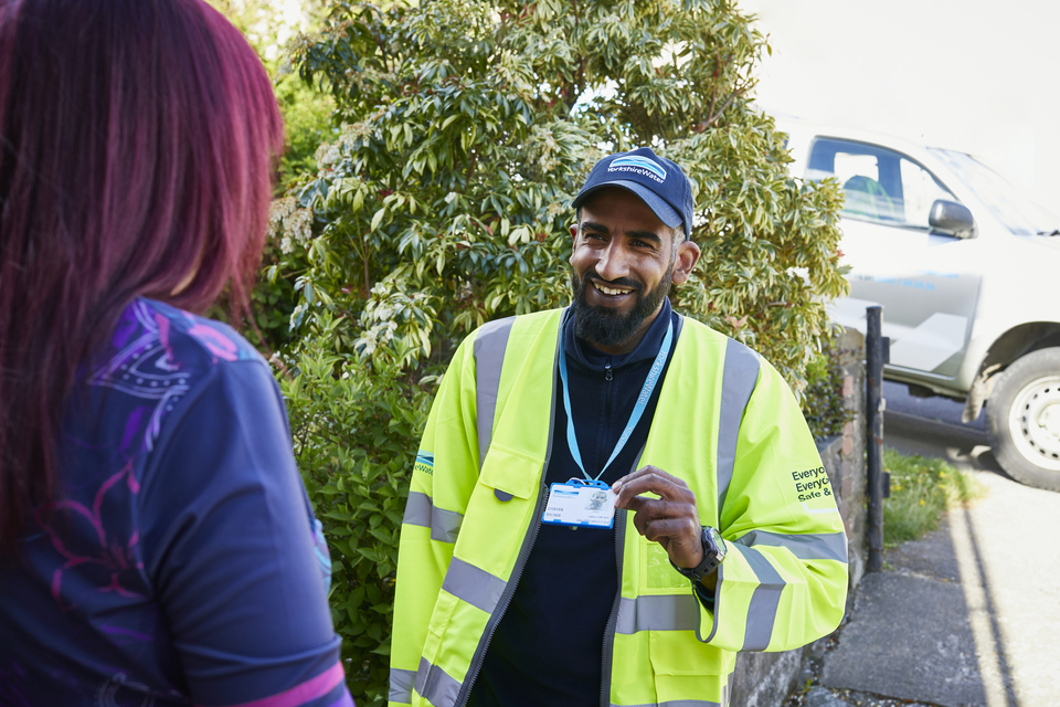 Yorkshire Water employee talking to customer