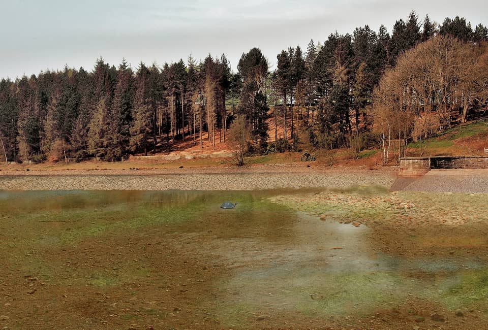 Artist impression of a dried out Langsett reservoir in 2071 - no water present and brown landscape