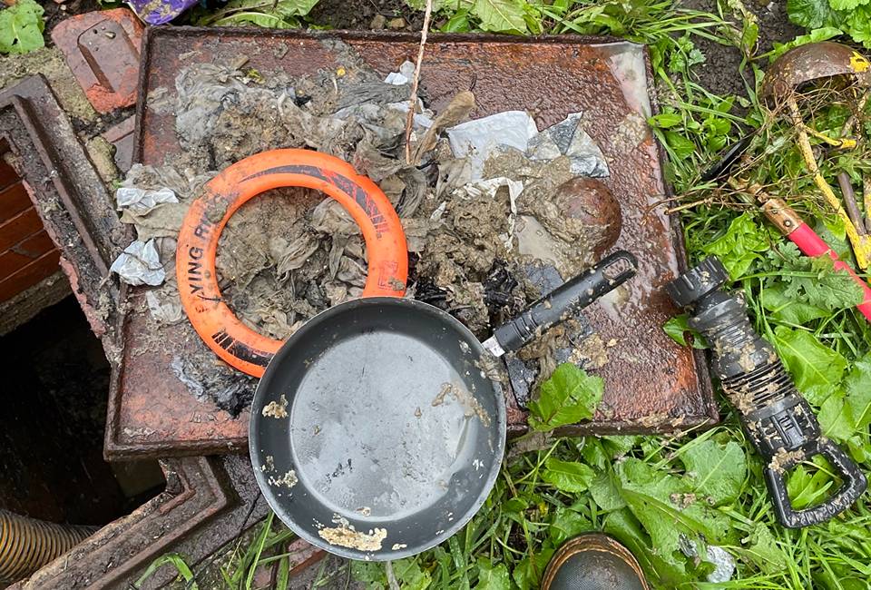 A frisbee and a frying pan removed from a Bradford sewer
