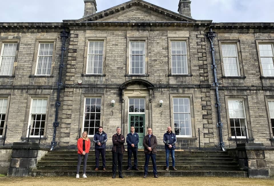 Yorkshire Water and LDN Architect employees stand outside Esholt Hall