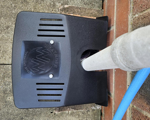 Leaf cover placed over a drain
