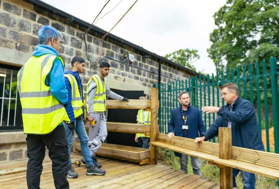 Yorkshire Water's Pete Coddington speaks to joinery students from Bradford College