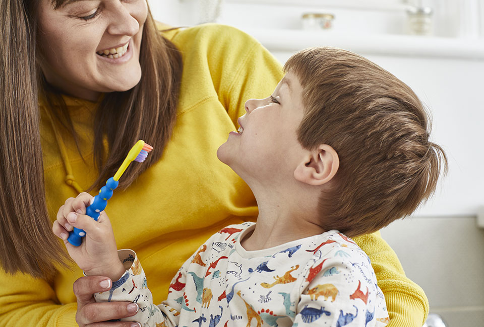 Child brushing teeth