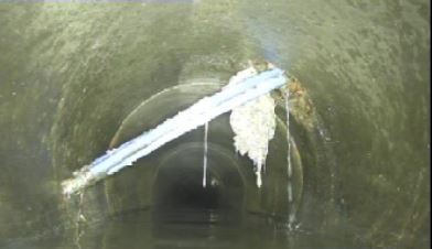 Drainage rods blocking a sewer