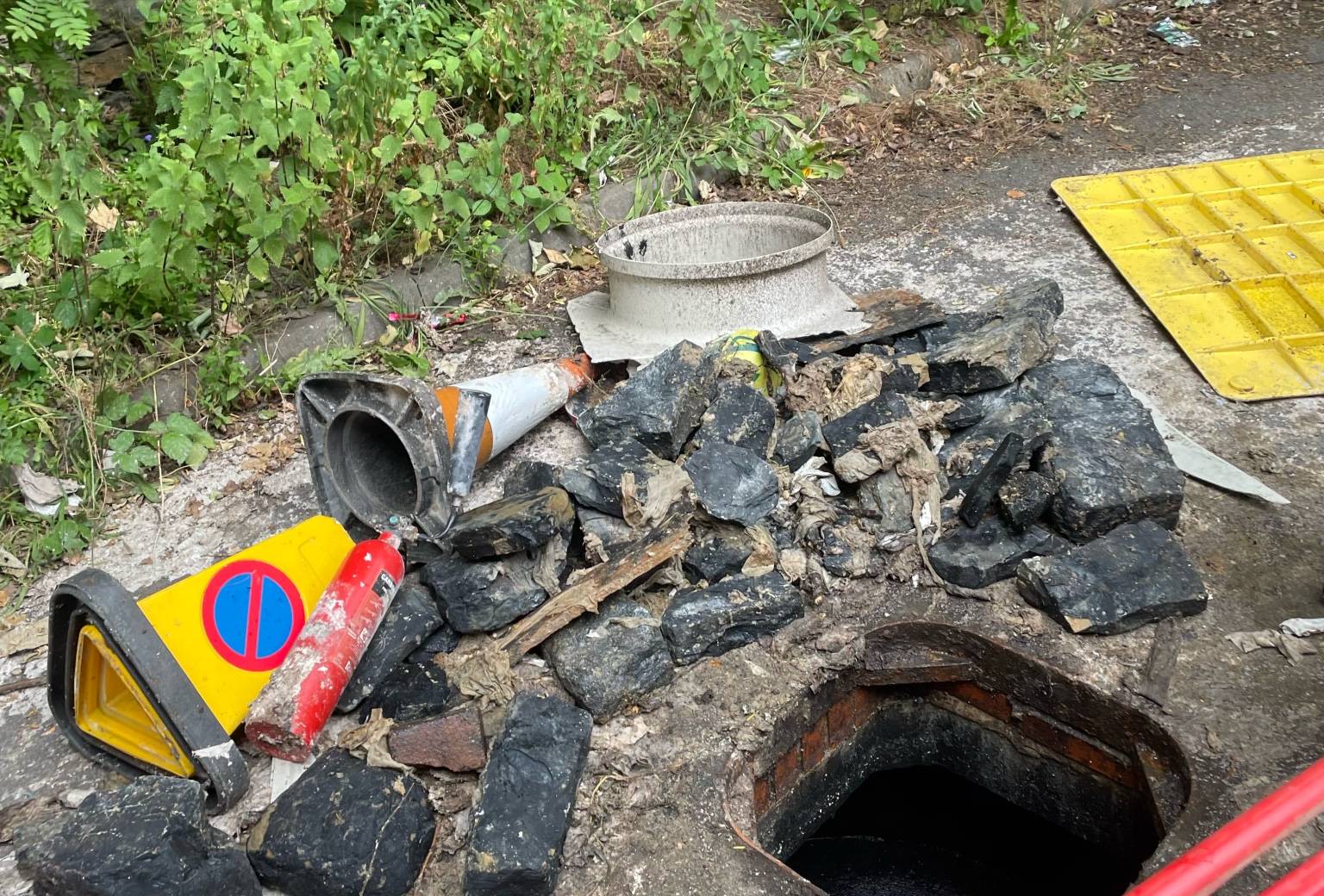 Traffic cones, fire extinguisher and debris removed from a Huddersfield sewer